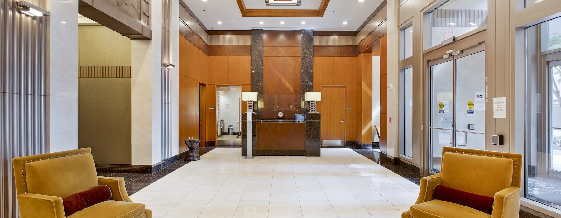 a leasing office lobby with chairs